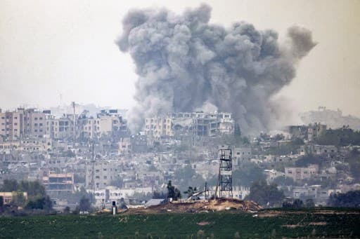 A smoke plume ascending following Israeli bombardment over the northern Gaza Strip. Photo: AFP