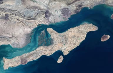 Multiple blasts reported near Iran's strategic Strait of Hormuz.