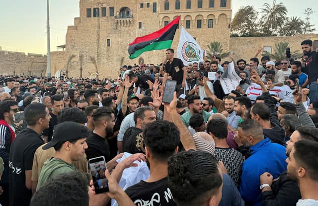 Demonstrators demand the overthrow of Libya's government of National Unity headed by Abdulhamid al-Dbeibah, in Martyrs' Square.