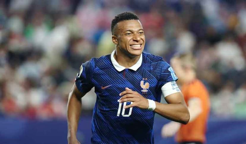 Mbappe double sends France into knockout