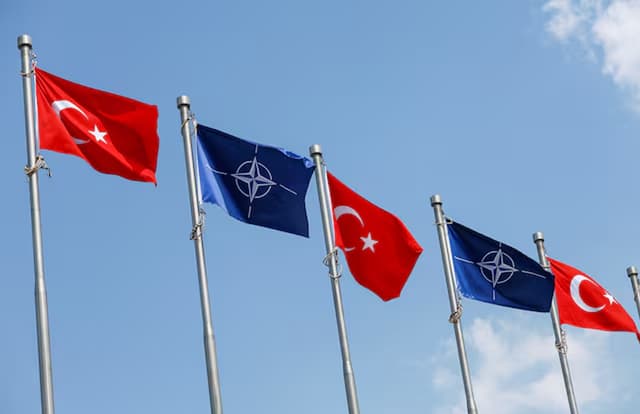 Turkiye and NATO flags wave ahead of the NATO summit, in Ankara.