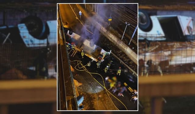 Rescuers attend the scene after bus crashes near Venice
