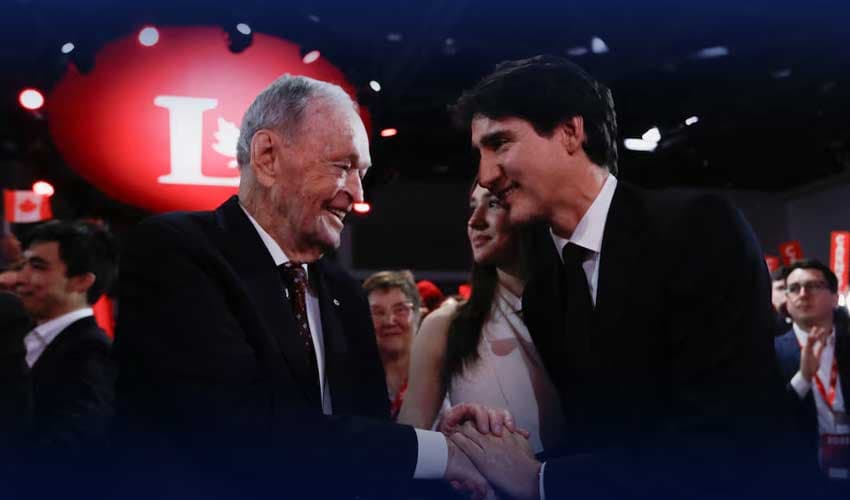 Justin Trudeau interact with Mark Carney