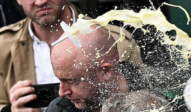 Woman who threw milkshake at Nigel Farage avoided jail (Courtesy: Online)