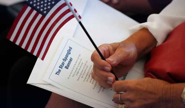 US pauses immigration applications