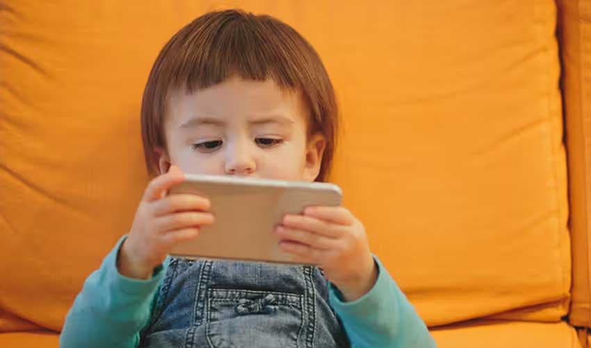 Excessive mobile phone use affects children's development (Courtesy: File) Excessive mobile phone use affects children's development (Courtesy: File)