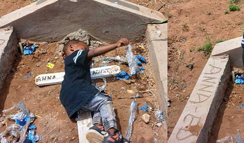 Kenyan child sleeps on mother’s grave in viral photograph (Courtesy: File) Kenyan child sleeps on mother’s grave in viral photograph (Courtesy: File)
