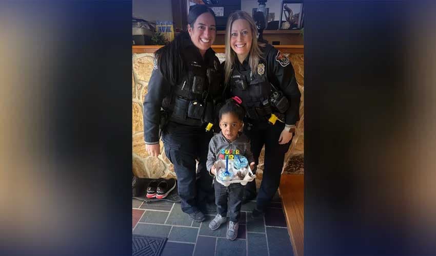 Police officers surprised a little boy Police officers surprised a little boy