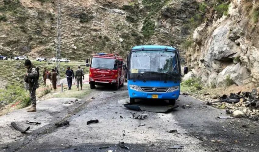 Security personnel inspect the site of a suicide attack near Besham city in the Shangla district of Khyber Pakhtunkhwa province. (AFP) Security personnel inspect the site of a suicide attack near Besham city in the Shangla district of Khyber Pakhtunkhwa province. (AFP)