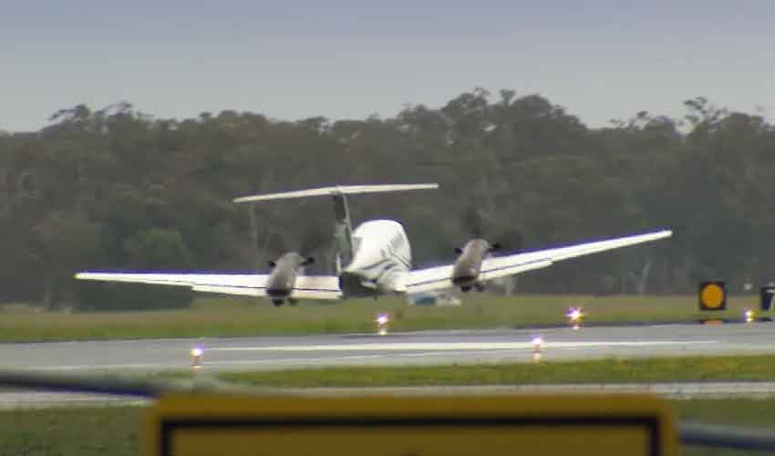 Australia plane makes emergency landing without gear