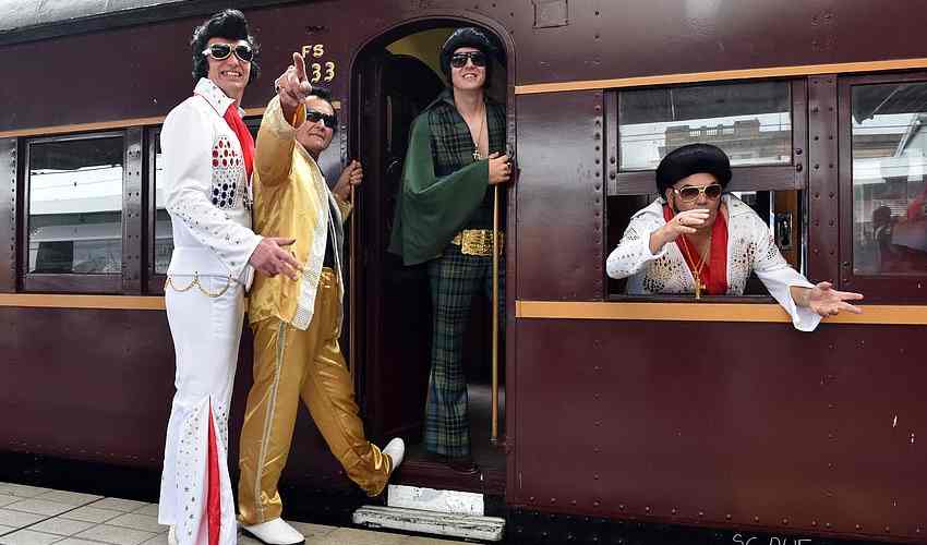 Sideburns, sweat and blue suede shoes on Australia's Elvis train