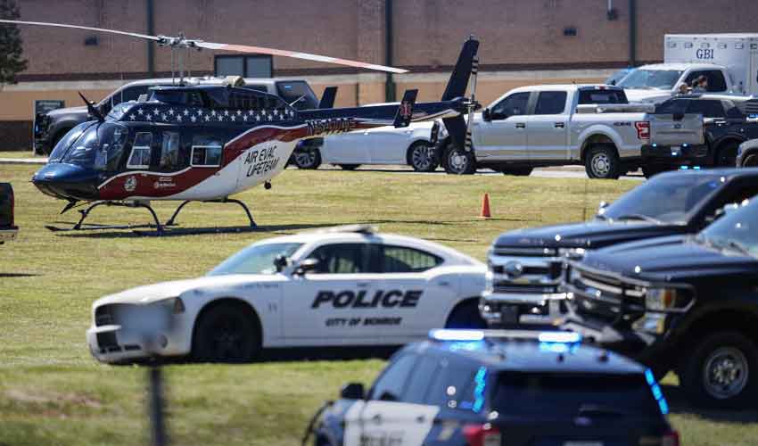 Georgia school student, 14, kills 4 and wounds 9 in campus shooting