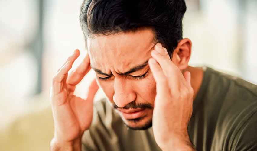 Why do people often experience severe headaches during cold weather